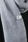 Uneven brooch