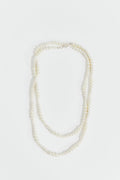 Long pearl necklace