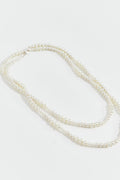 Long pearl necklace
