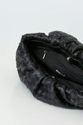 Braided clutch bag