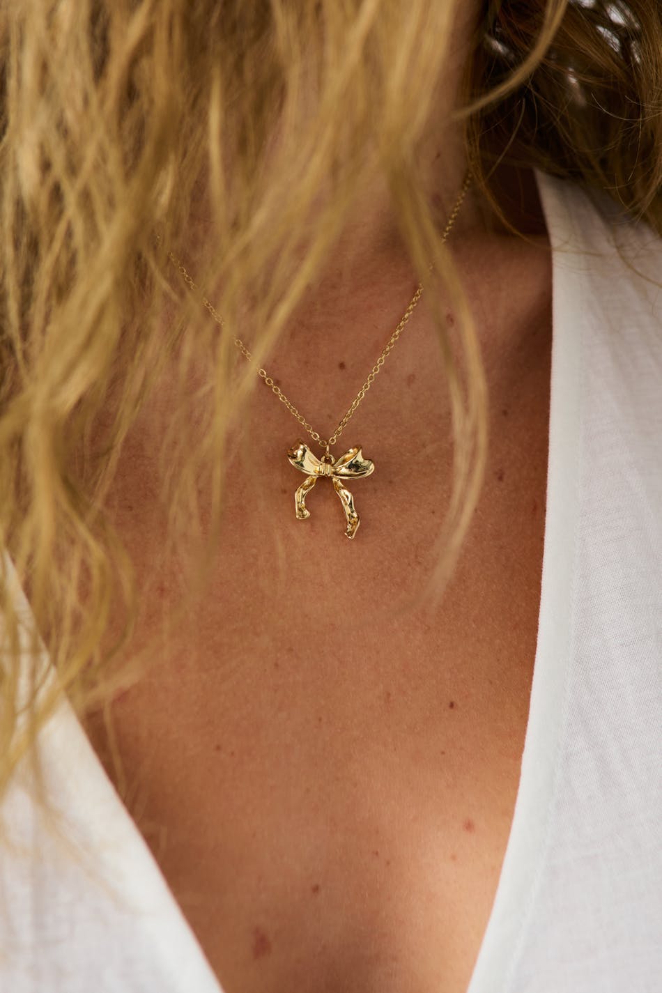 Bow necklace - Doré