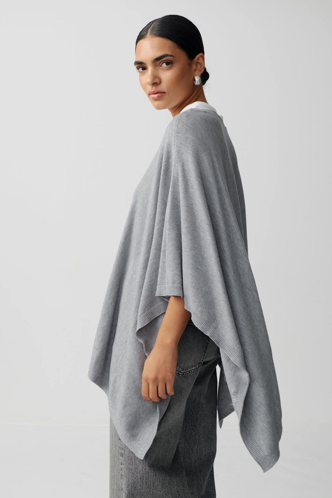 Knitted poncho - Greymelange