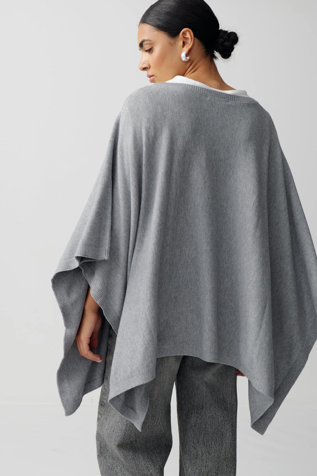 Knitted poncho - Greymelange