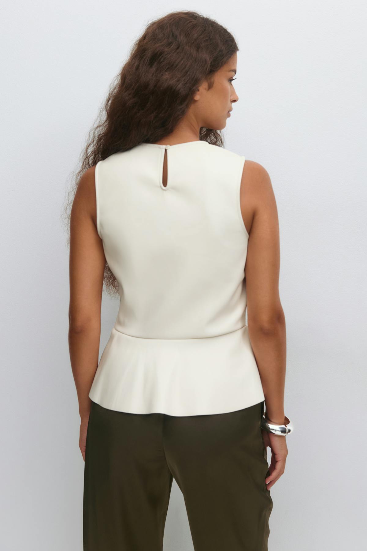 Pu peplum top - Gardenia