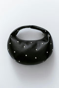 Soft round studded handbag