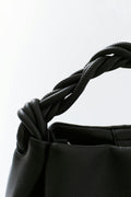 Small braided top handle bag