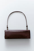 Small patent shoulder bag