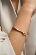 Wavy gold bracelet - Doré